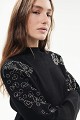 Knitted blouse with embroidered sleeve details