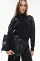 Knitted blouse with embroidered sleeve details