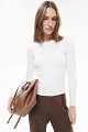 Knitted blouse with rhinestones and lace sleeves