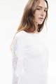 Knitted blouse with rhinestones and lace sleeves
