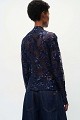 Sheer top with sequin embellishments