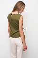Sleeveless top with a decorative bow