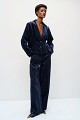 Pleated velvet-look trousers