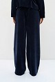 Pleated velvet-look trousers