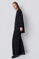 Pantalones de punto con botones a presión laterales