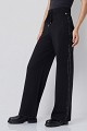 Pantalones de punto con botones a presión laterales