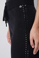 Pantalones de punto con botones a presión laterales