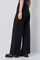 Pantalones de punto con botones a presión laterales