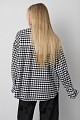 Checked shirt with ruffle details