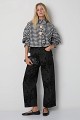 Camisa a cuadros con detalles de volantes