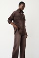 Denim shirt with rhinestone embellishments