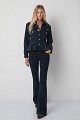 Denim jacket with decorative buttons