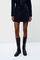 Velvet-look shorts with decorative buttons
