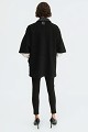 Cape with a combination of leather-look and wool fabric