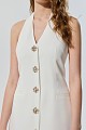 Vestido mini con botones adornados con joyas