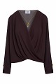 Wrap blouse with a decorative necklace