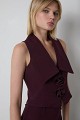Sleeveless blouse with lapels and floral details