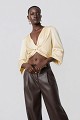Satin-look top with a front knot