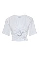 Cropped top with shoulder pads and appliqué flower