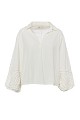 Blouse with broderie on the sleeves