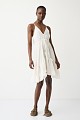 Mini dress with ruffles and open back