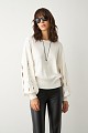 Sweater with cut outs on the sleeves