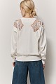 Sweater with motive and beads