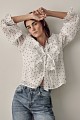 Polka dot shirt with ruffles