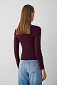 Cut out sweater with rhinestones