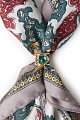 Printed scarf with jewelry