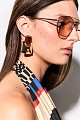 Earrings with shiny stone