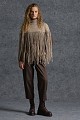 Knitted fringed cape