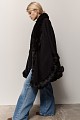 Knitted cape with faux fur