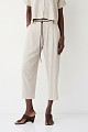 Tailored trousers with a decorative belt