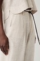 Tailored trousers with a decorative belt