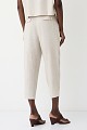 Tailored trousers with a decorative belt