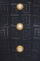 Sweater with bejewelled buttons