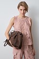 Blusa sin mangas transparente