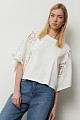 Top with embroidered short sleeves