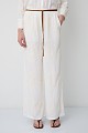 High-waisted trousers with embroidered detailing