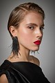 Hanging earrings with feathers