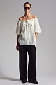 Off-shoulder blouse with decorative pockets