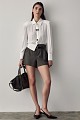 Blouse with long sleeves and pins