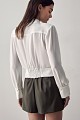 Blouse with long sleeves and pins
