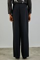 Trousers with pleats