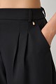 Pants with pleats and elasticated waist
