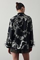 Printed shirt with feathers