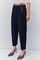 Pantalones a rayas con cinturón y cadena