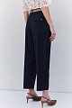 Pantalones a rayas con cinturón y cadena
