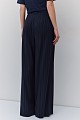Pantalones a rayas con dije